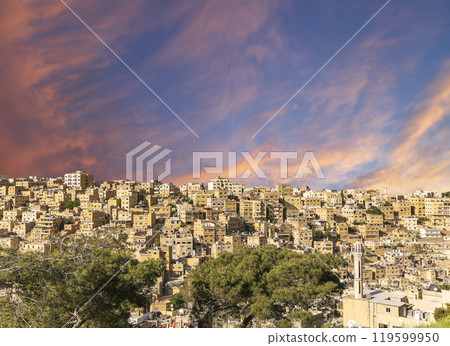 Amman city landmarks-- old roman Citadel Hill, Jordan. Against the background of a beautiful sky with clouds 119599950