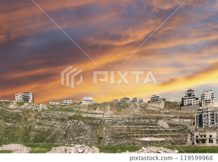 Amman city landmarks-- old roman Citadel Hill, Jordan. Against the background of a beautiful sky with clouds 119599968