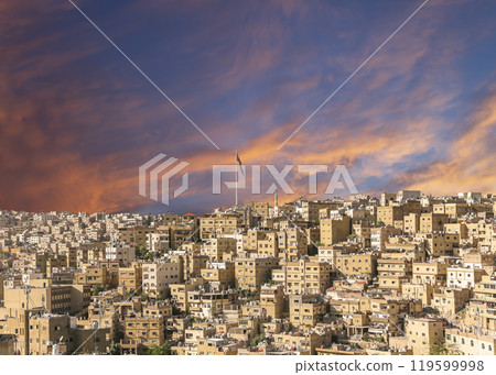 Amman city landmarks-- old roman Citadel Hill, Jordan. Against the background of a beautiful sky with clouds Amman city landmarks-- old roman Citadel Hill, Jordan. Against the background of a beautiful sky with clouds 119599998