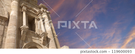 Arch of Hadrian in Gerasa (Jerash)-- was built to honor the visit of emperor Hadrian to Jerash in 129/130 AD, Jordan. Against the background of a beautiful sky with clouds 119600093