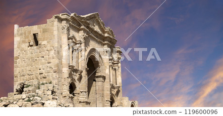 Arch of Hadrian in Gerasa (Jerash)-- was built to honor the visit of emperor Hadrian to Jerash in 129/130 AD, Jordan. Against the background of a beautiful sky with clouds 119600096