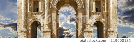 Arch of Hadrian in Gerasa (Jerash)-- was built to honor the visit of emperor Hadrian to Jerash in 129/130 AD, Jordan. Against the background of a beautiful sky with clouds 119600125