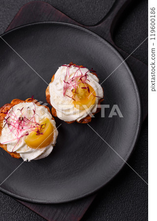 Sweet or sour cupcake with cream cheese, microgreens and filling Sweet or sour cupcake with cream cheese, microgreens and filling 119600186
