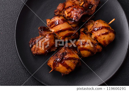 Grilled chicken or turkey shish kebab with salt, spices and herbs 119600291