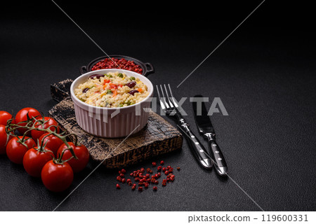 Boiled wheat bulgur porridge with vegetables peppers, peas, corn 119600331