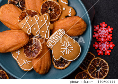French classic madeleine sponge cake with elements of Christmas motifs 119600354
