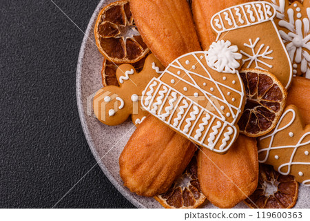 French classic madeleine sponge cake with elements of Christmas motifs 119600363