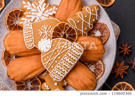 French classic madeleine sponge cake with elements of Christmas motifs 119600366