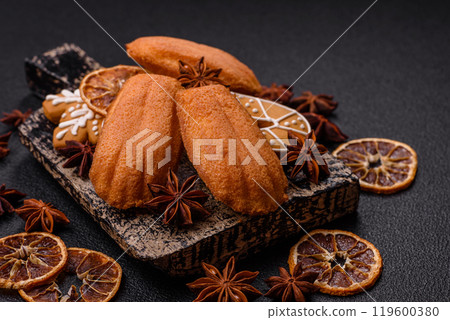 French classic madeleine sponge cake with elements of Christmas motifs 119600380