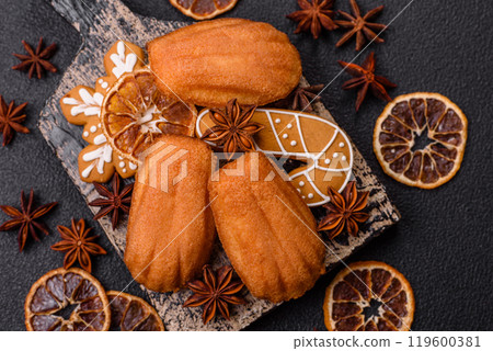 French classic madeleine sponge cake with elements of Christmas motifs 119600381