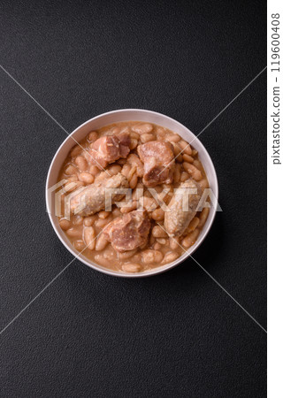 Cassoulet with white beans, meat and sausages, vegetables, salt and spices Cassoulet with white beans, meat and sausages, vegetables, salt and spices 119600408
