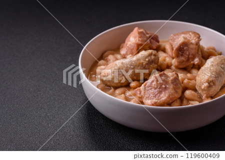 Cassoulet with white beans, meat and sausages, vegetables, salt and spices 119600409
