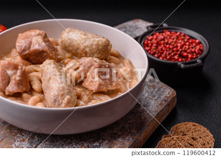 Cassoulet with white beans, meat and sausages, vegetables, salt and spices Cassoulet with white beans, meat and sausages, vegetables, salt and spices 119600412