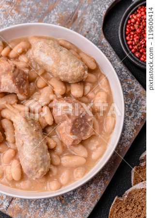 Cassoulet with white beans, meat and sausages, vegetables, salt and spices Cassoulet with white beans, meat and sausages, vegetables, salt and spices 119600414
