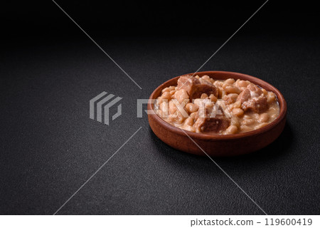 Cassoulet with white beans, meat and sausages, vegetables, salt and spices Cassoulet with white beans, meat and sausages, vegetables, salt and spices 119600419