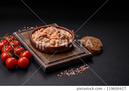 Cassoulet with white beans, meat and sausages, vegetables, salt and spices Cassoulet with white beans, meat and sausages, vegetables, salt and spices 119600427