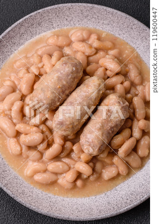 Cassoulet with white beans, meat and sausages, vegetables, salt and spices 119600447