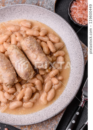 Cassoulet with white beans, meat and sausages, vegetables, salt and spices Cassoulet with white beans, meat and sausages, vegetables, salt and spices 119600449