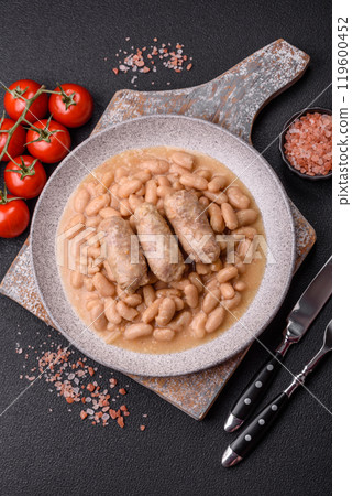 Cassoulet with white beans, meat and sausages, vegetables, salt and spices 119600452