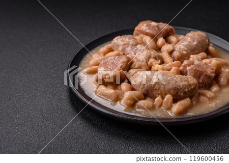 Cassoulet with white beans, meat and sausages, vegetables, salt and spices 119600456