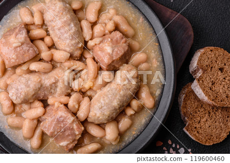 Cassoulet with white beans, meat and sausages, vegetables, salt and spices 119600460