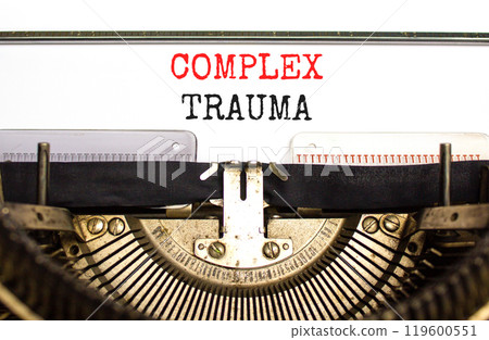 Complex trauma symbol. Concept words Complex trauma typed on white paper on old retro typewriter. Beautiful white background. Business psychology complex trauma concept. Copy space. Complex trauma symbol. Concept words Complex trauma typed on white paper on old retro typewriter. Beautiful white background. Business psychology complex trauma concept. Copy space. 119600551