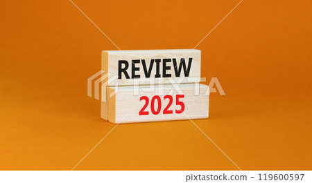 Planning review 2025 new year symbol. Concept words Review 2025 on beautiful wooden blocks. Beautiful orange background. Business review 2025 new year concept. Copy space. Planning review 2025 new year symbol. Concept words Review 2025 on beautiful wooden blocks. Beautiful orange background. Business review 2025 new year concept. Copy space. 119600597