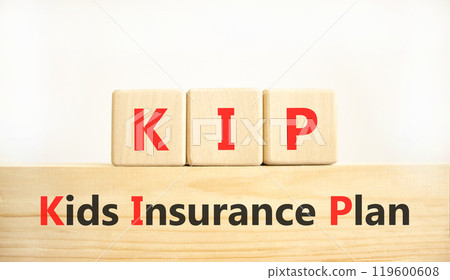 KIP kids insurance plan symbol. Concept words KIP kids insurance plan on beautiful wooden blocks. Beautiful white background. Business KIP kids insurance plan concept. Copy space. 119600608