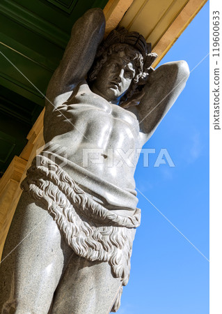 Statue of Atlant on the portico of the New Hermitage in St Petersburg, Russia 119600633