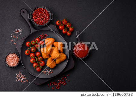 Breaded camembert or brie cheese baked in the form of nuggets with salt and spices 119600728