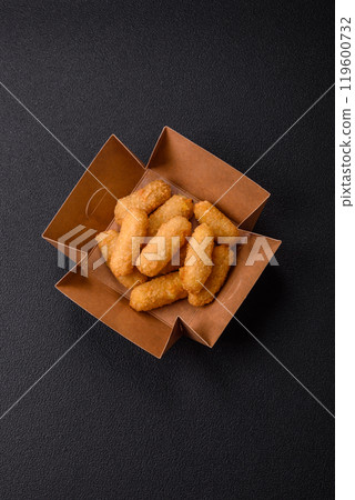Fast food breaded cheese sticks with salt and spices 119600732