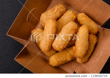Fast food breaded cheese sticks with salt and spices Fast food breaded cheese sticks with salt and spices 119600734