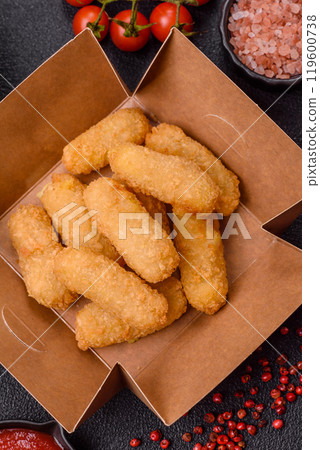 Fast food breaded cheese sticks with salt and spices 119600738