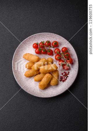 Fast food breaded cheese sticks with salt and spices 119600755