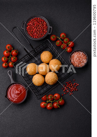 Fast food cheese balls breaded with salt and spices 119600795