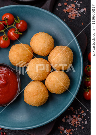 Fast food cheese balls breaded with salt and spices Fast food cheese balls breaded with salt and spices 119600817