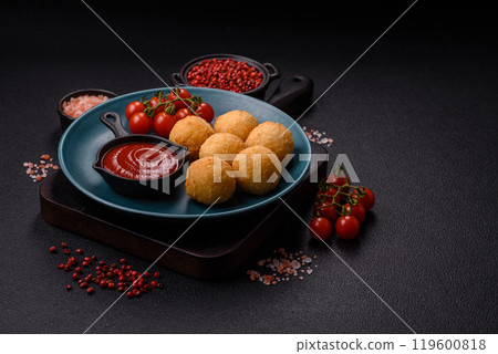 Fast food cheese balls breaded with salt and spices 119600818