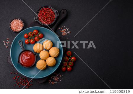 Fast food cheese balls breaded with salt and spices 119600819