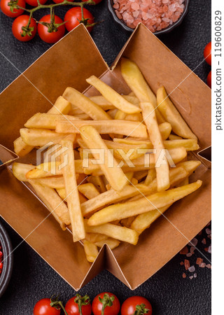 Fast food french fries with salt and spices Fast food french fries with salt and spices 119600829