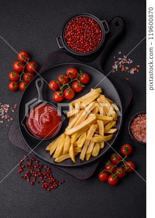 Fast food french fries with salt and spices 119600870