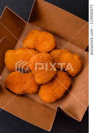 Fast food chicken nuggets breaded with salt and spices 119600875