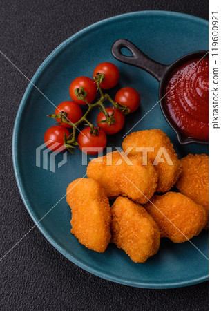 Fast food chicken nuggets breaded with salt and spices 119600921