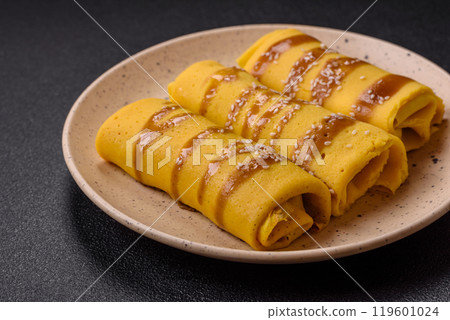Sweet or savory crepe with different fillings for a hearty breakfast Sweet or savory crepe with different fillings for a hearty breakfast 119601024