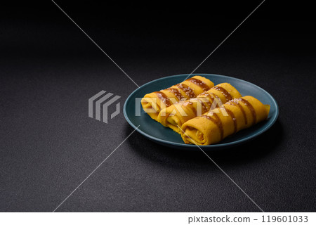 Sweet or savory crepe with different fillings for a hearty breakfast 119601033