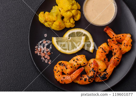 Boiled tiger prawns with white sauce and lemon Boiled tiger prawns with white sauce and lemon 119601077