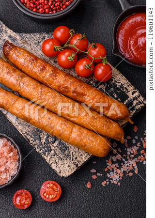 Juicy fried beef or pork sausages with salt, spices and herbs Juicy fried beef or pork sausages with salt, spices and herbs 119601143