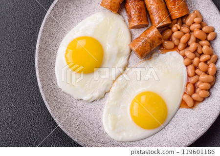 Full English breakfast with boiled eggs, beans, sausages, tomatoes Full English breakfast with boiled eggs, beans, sausages, tomatoes 119601186