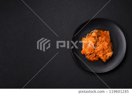 Sliced fish in tomato sauce with salt and spices Sliced fish in tomato sauce with salt and spices 119601285