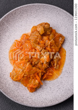 Sliced fish in tomato sauce with salt and spices Sliced fish in tomato sauce with salt and spices 119601300
