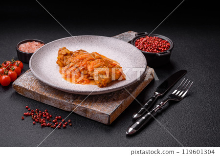Sliced fish in tomato sauce with salt and spices Sliced fish in tomato sauce with salt and spices 119601304